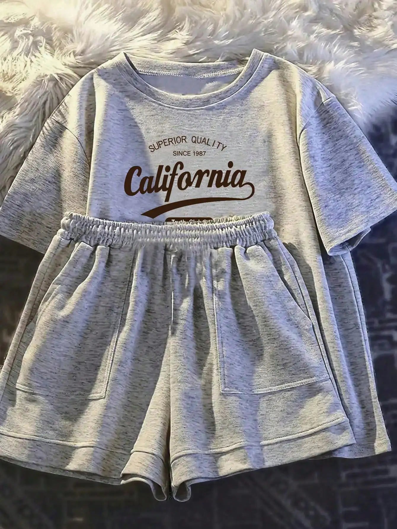 Short sleeved T-shirt paired with casual shorts Set