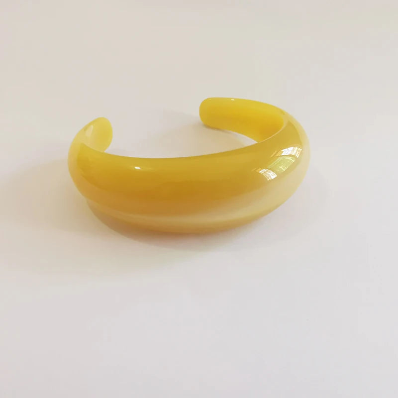 Exaggerated Jelly Colored Curved Cuff Bracelets