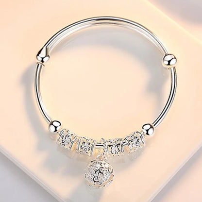 DANA Silver Hollow Bells Ball Bangles Bracelets