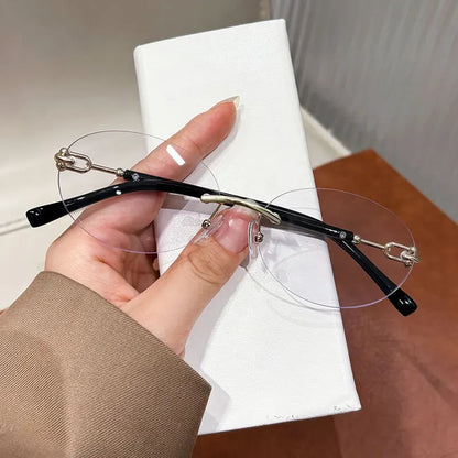 Cutting rimless small round sunglasses