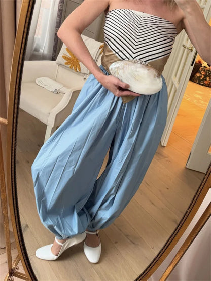 Pantalones de tiro alto y pierna ancha con bolsillos