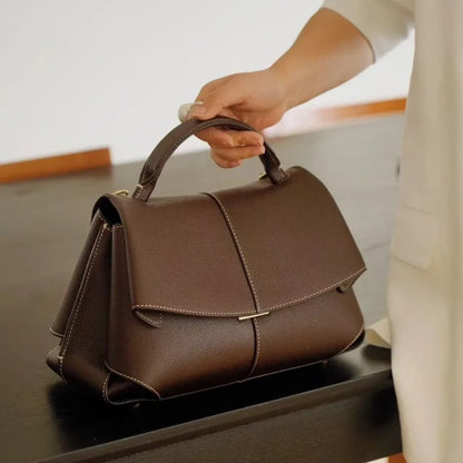 Leather pleated handbag