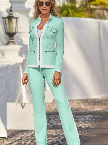 Conjunto elegante, ajustado y sencillo de pantalón deportivo recto con cremallera y top.