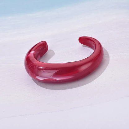 Exaggerated Jelly Colored Curved Cuff Bracelets