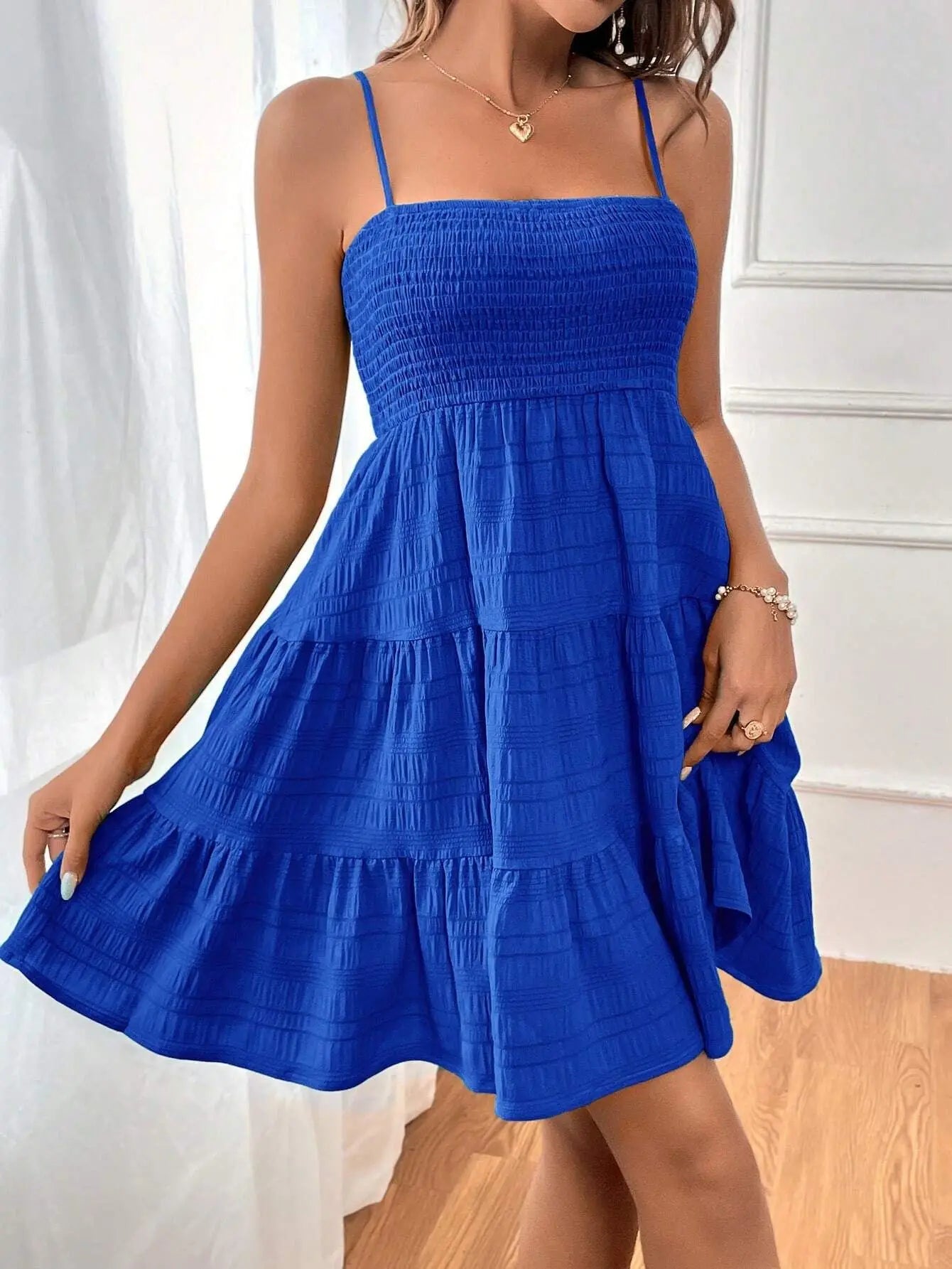 Spaghetti Strap Smocked Bustier Mini Swing Dress
