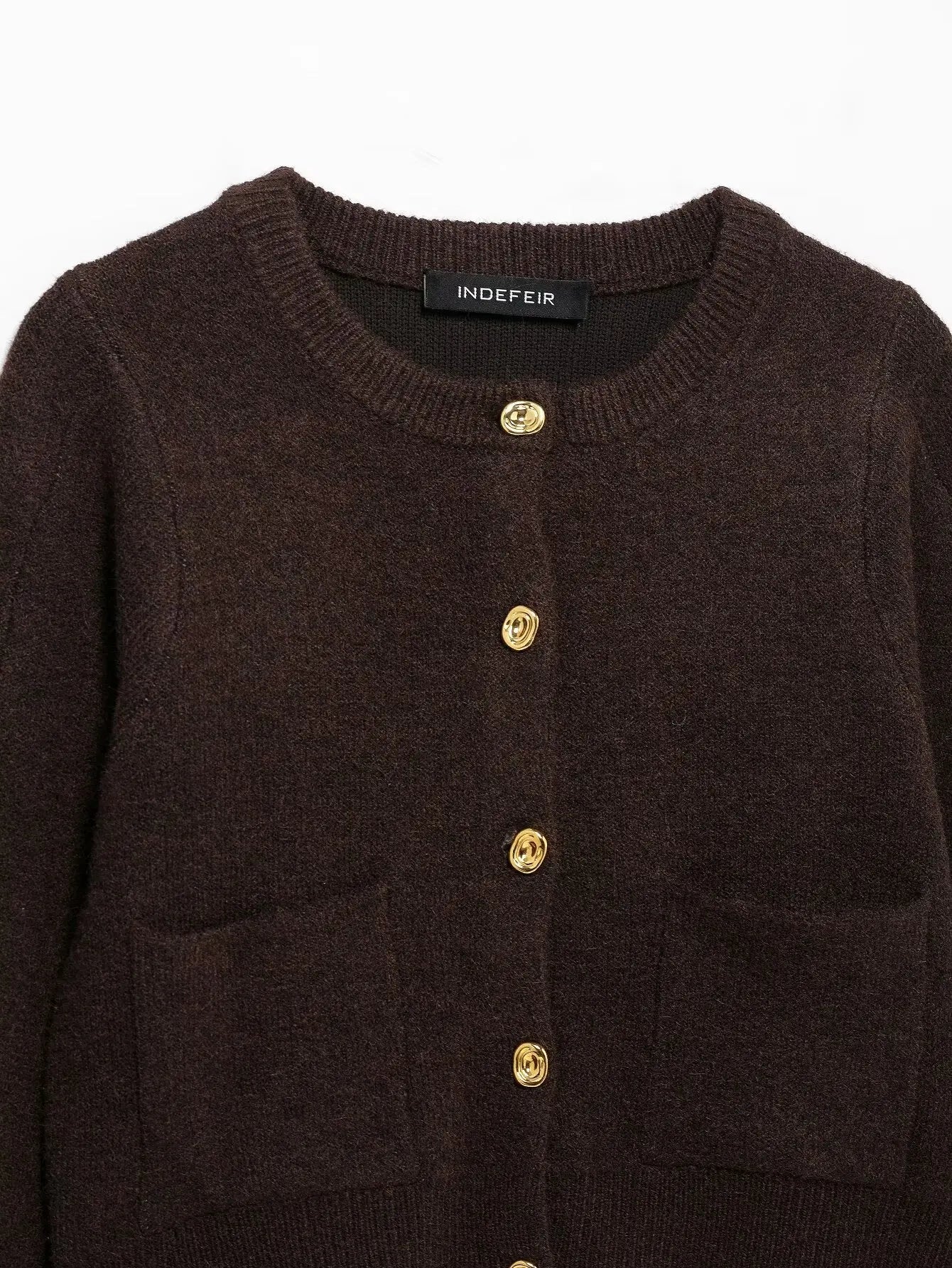 Falda mini ajustada de punto de manga larga con cuello redondo