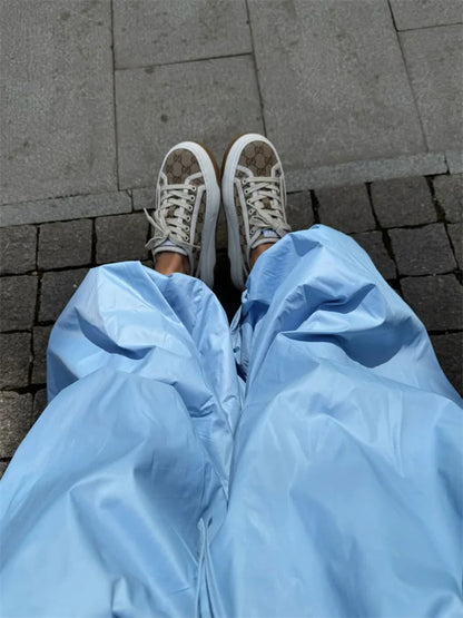 Pantalones de tiro alto y pierna ancha con bolsillos