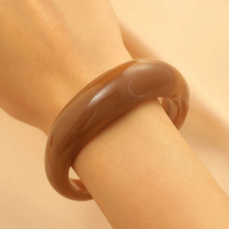 Exaggerated Jelly Colored Curved Cuff Bracelets