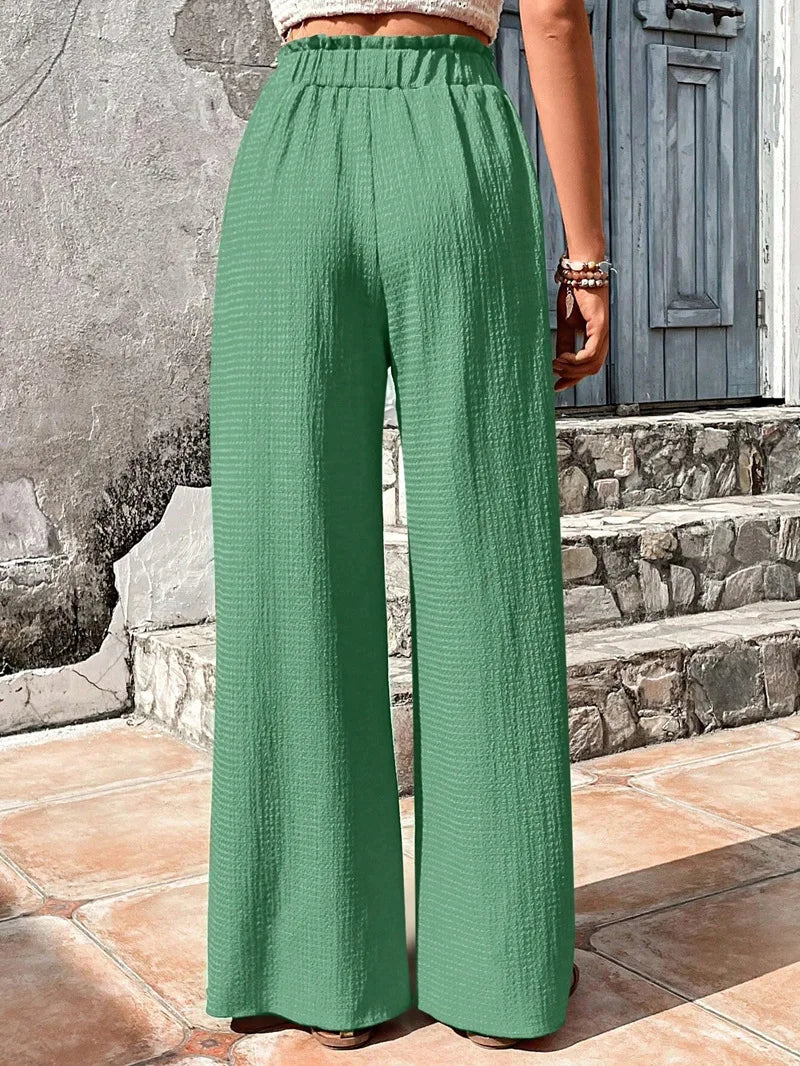 Pantalones de pierna ancha con cintura elástica alta