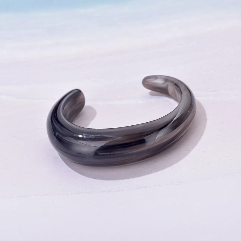 Exaggerated Jelly Colored Curved Cuff Bracelets