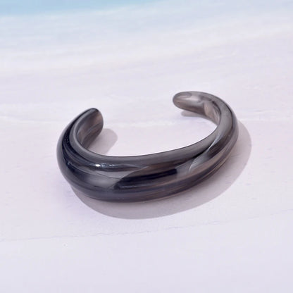 Exaggerated Jelly Colored Curved Cuff Bracelets